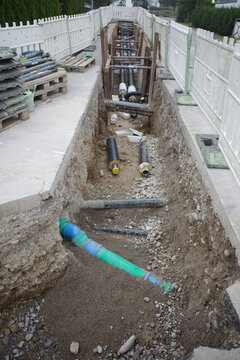 Trench with pipes for utility installation