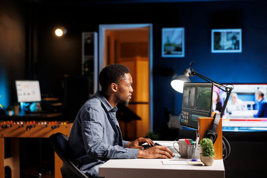 Video editor creating visual effects on film montage at home, working on color correction and grading to edit footage and frames. Freelancer digital creator editing clips on computer software.