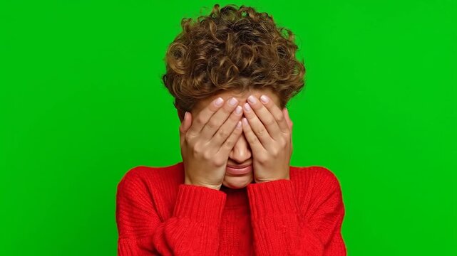 Female facepalming after making a silly mistake 