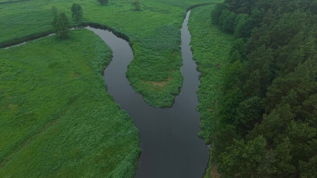 River Confluence &ndash; Low Backward Wide Vertical Rise Aerial Flight Over Watershed