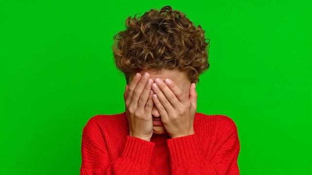 Female facepalming after making a silly mistake