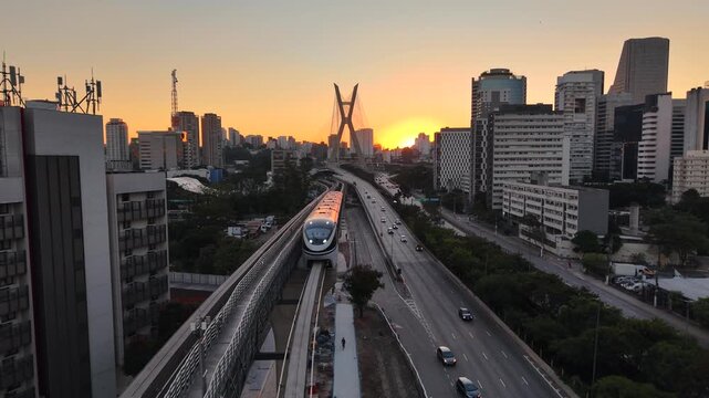 Drone view of the monorail on Avenida dos Bandeirantes with the Oct&aacute;vio Frias de Oliveira Bridge in the background