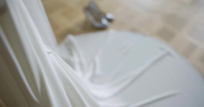 Close-up of a white toilet seat in a bathroom