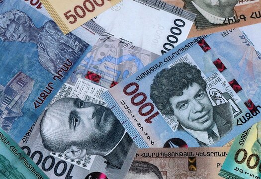 Armenian dram money banknotes bunch on table. Armenia bills of AMD currency close up