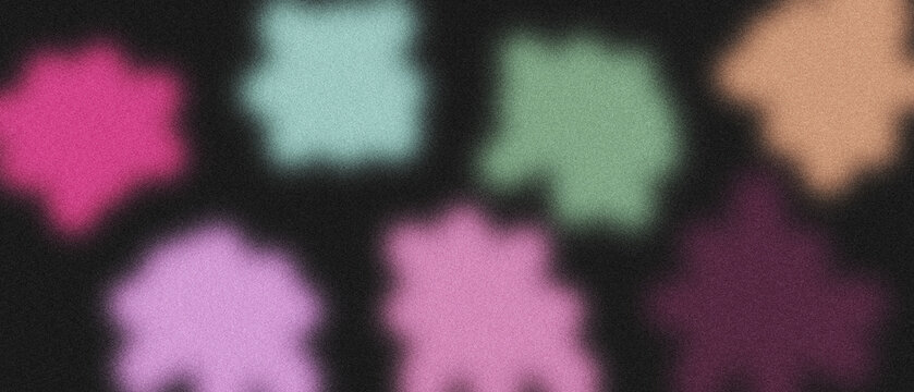 Abstract colorful gradient shapes with grainy noise texture on dark background for creative designs.