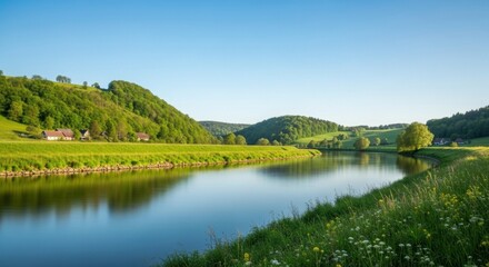 Obraz premium Serene River Flowing Through Lush Green Hills