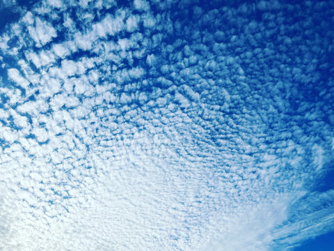 Beautiful blue sky with white cirrocumulus clouds and natural atmosphere in autumn weather
