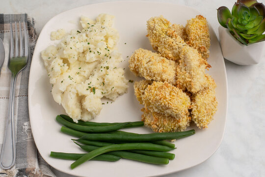 haddock bites with mash potatoes  top with parsley