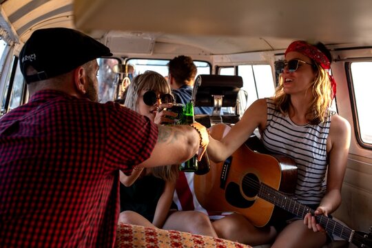 Friends enjoying van road trip