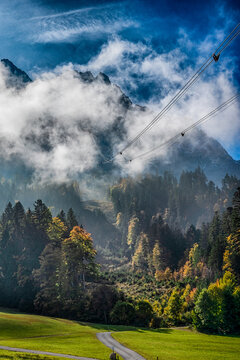 Zugspitze Alpine Road Through Cloudy Mountain Forest