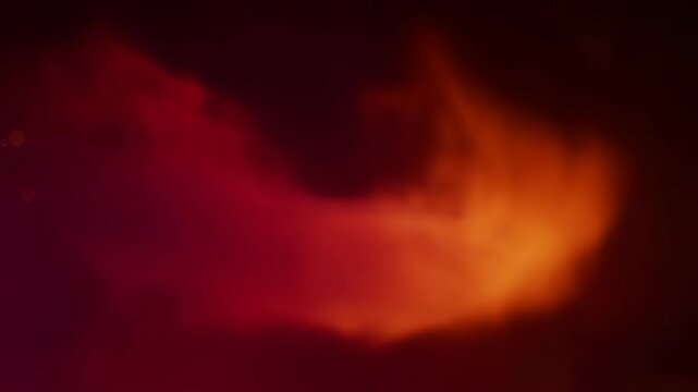 Abstract fire light texture smoke orange glow dark flame heat ember blur soft light, orange fire light smoke texture glowing bokeh dark abstract background warm atmospheric, fire light texture smoke