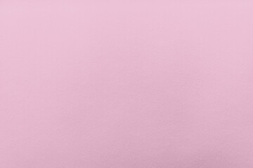 Soft pink textured background, ideal for design or presentations.