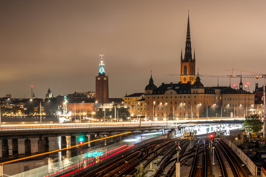 Stockholm Skyline Reflections Across Blue Hour Waterfront