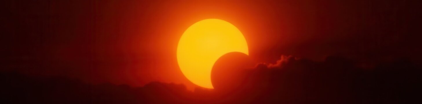 Dramatic partial solar eclipse, sun's golden aura, moon's dark silhouette , phenomenon, silhouette