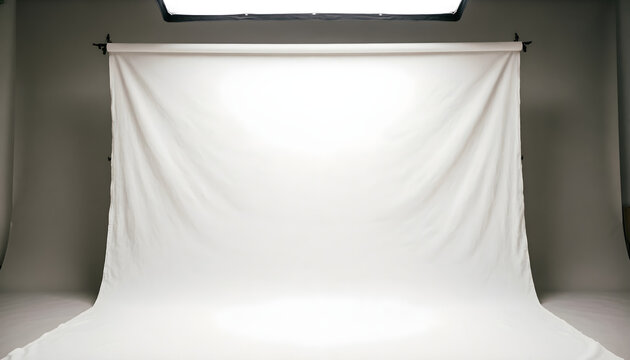 White Fabric Backdrop in Photography Studio with Soft Lighting and Copy Space