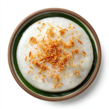Banh Khoai Mi steamed cassava cake with coconut shreds isolated on a white background