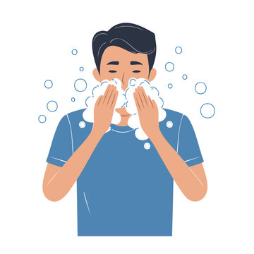Man washing face with soap and bubbles