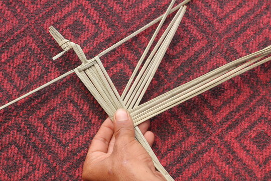 The process of making suket puppets, which are made from a type of grass called mendong