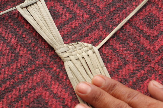 The process of making suket puppets, which are made from a type of grass called mendong