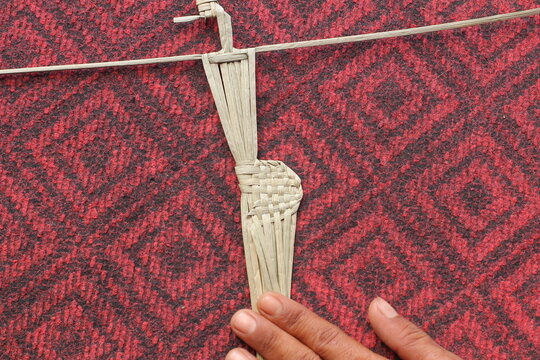 The process of making suket puppets, which are made from a type of grass called mendong
