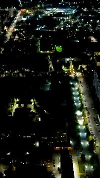 Vertical video. Oryol, Russia. Victory Boulevard. History Center. View of the city from the air. Night flight. Drone footage. Rich colors