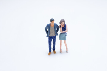 Fototapeta premium A Miniature couple standing relationship concept