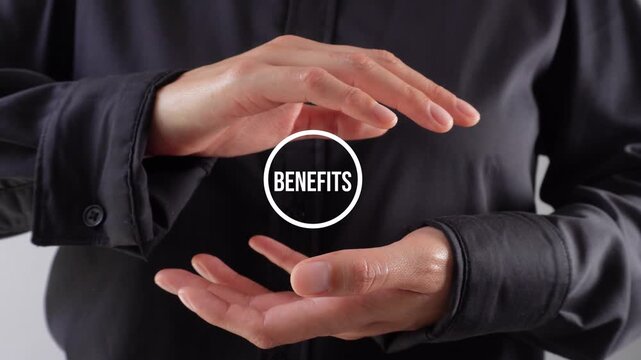 Close-up of a pair of women's hands shielding an animated button with the word "Benefits"