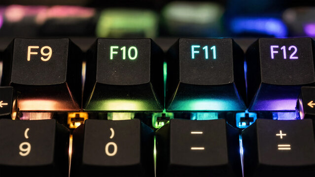 Closeup of a mechanical gaming keyboard with colorful rgb led backlighting