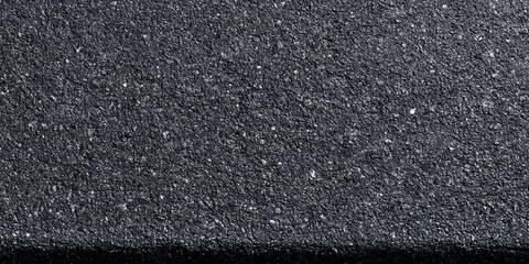 Fototapeta premium Textured Asphalt Road Surface with Fine Gravel and Tiny Stones