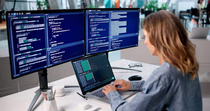 Experienced Woman Writes Software Code