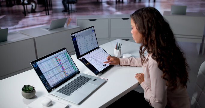 Young Latina Accountant Uses Digital Tools