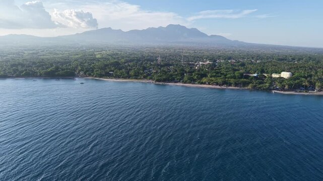 Aerial Drone, Pull Back Over Bay to Cuernos de Negros Volcano, Philippines, 4K