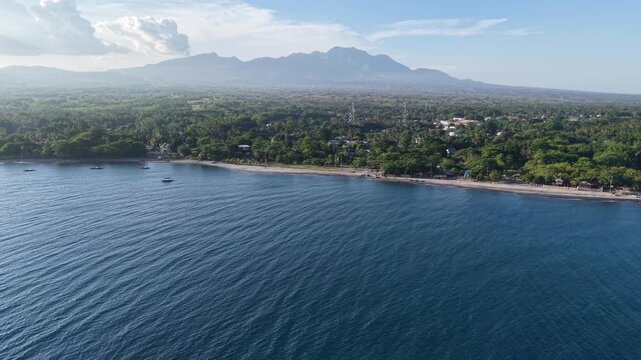 Aerial Drone, Flying Toward Zamboanguita Coast and Volcano, Philippines, 4K
