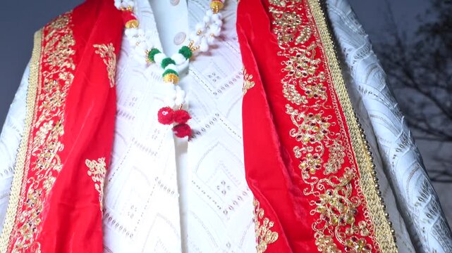 Traditional Indian Groom Wedding Attire with Sherwani, Turban and Mojari Display Before Marriage Ceremony