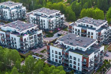 Fototapeta premium Apartment complex with balconies patios and garden areas