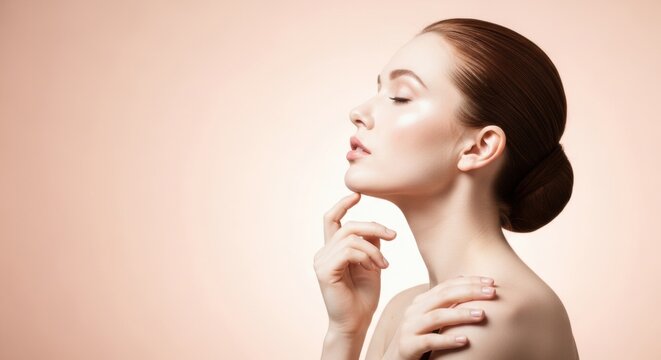 A woman with her eyes closed touching her face