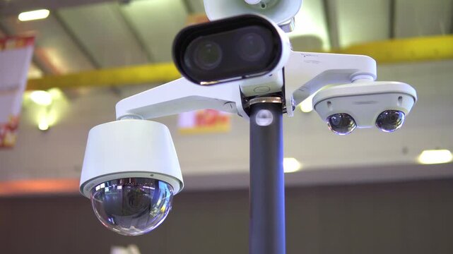 Multiple cctv security cameras monitoring a public area