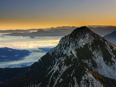 Sunrise in the mountains, view of Salzburg with fog, Hochstaufen, Zwiesel, Bad Reichenhall, Berchtesgadener Land, Upper Bavaria, Bavaria, Germany