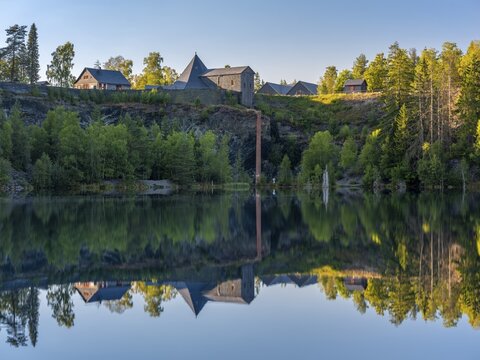 The slate lake in the Kie&szlig;lichbruch in the evening light, former slate quarry, Technical Monument Historic Slate Mining Lehesten, Thuringia, Germany