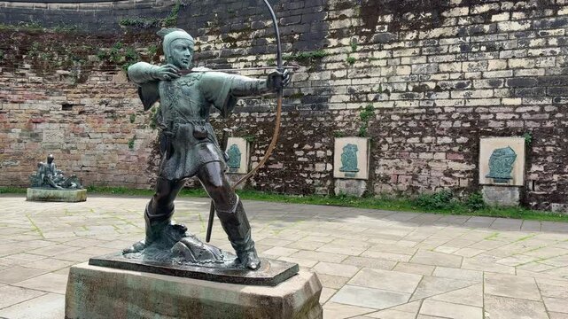 View of the Robin Hood Statue on Castle Road near Nottingham Castle in Nottingham, England, featuring one of the city's most iconic landmarks.