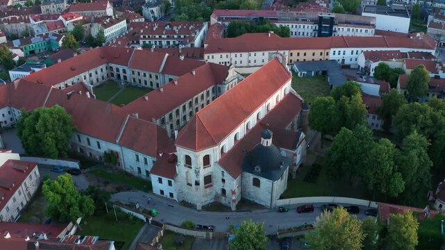 Vilnius, Lithuania &ndash; June 10, 2026: Cinematic aerial view of the Church of the Assumption of the Blessed Virgin Mary above Vilnius Old Town