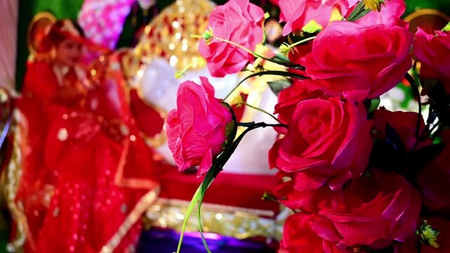 The vibrant floral setup represents traditional Indian wedding celebrations, marriage ceremonies, reception events, cultural festivities, event planning, luxury decoration, and romantic occasions.