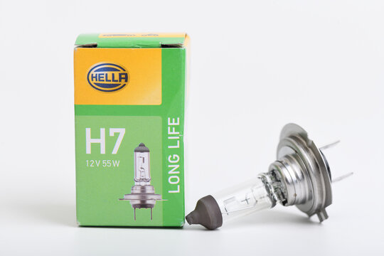 Hella H7 12V 55W halogen car light bulb with cardboard box.