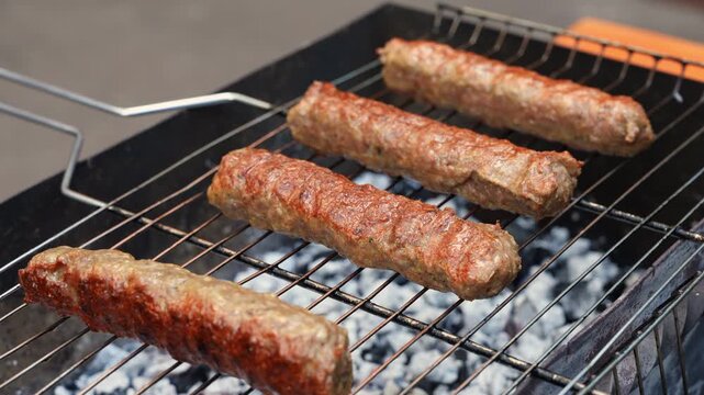 Grilling kebab on patio barbecue during a sunny summer day