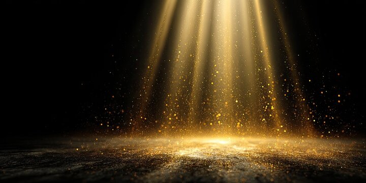 Golden light beams illuminating a dark space with sparkling particles