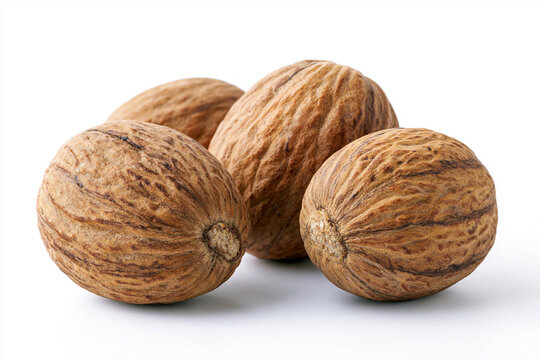 Whole Nutmeg Spice isolated on white background