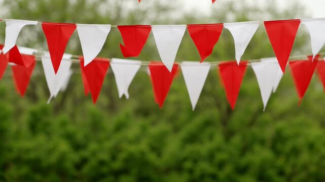 Red and white triangular pennant banner.