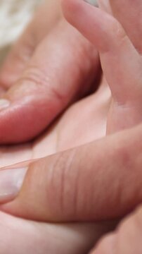 Spa. A massage therapist is working with a young woman - Vertical video