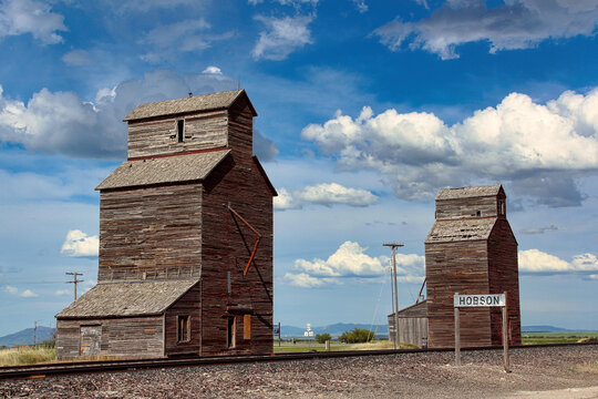 Iconic Wooden Century Old Grain Elevators in Hobson Montana.  These Landmarks were built in 1908 and still stand to this day.
