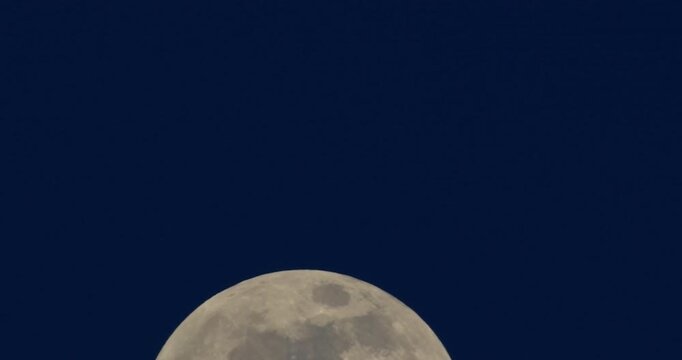 Timelapse scene of moon in the sky